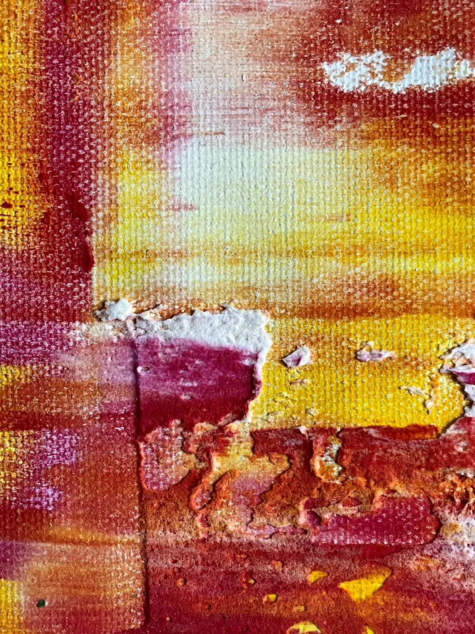Close-up of a textured abstract painting with warm red and yellow tones, showcasing intricate details.